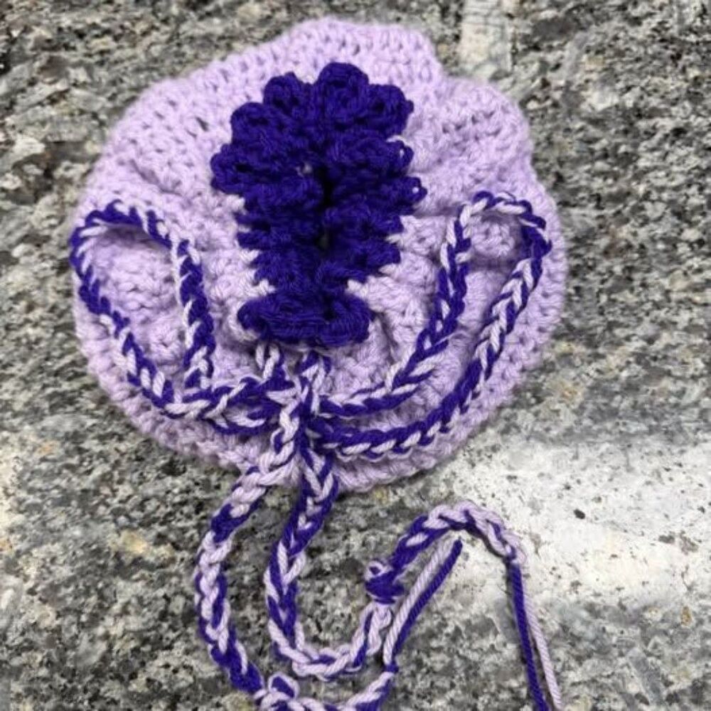 Crocheted purple pouch